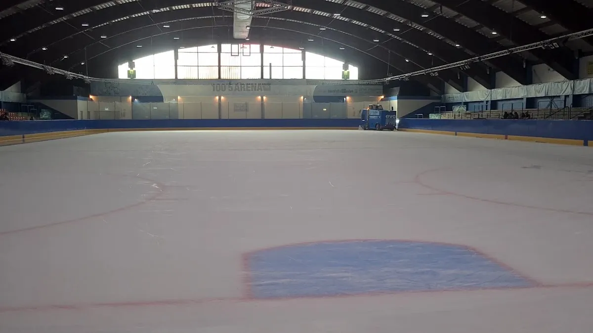 The ice surface of the 100,5 Arena in Aachen under its wooden roof. — 100,5 Arena