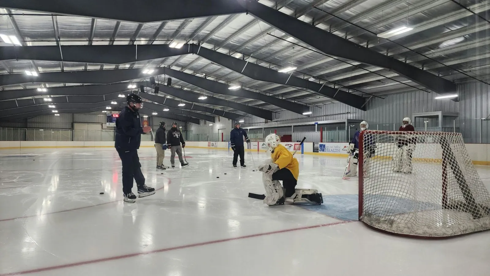 Skaters at a practice on the ice inside the Multi-Use Pavilion, from the rink's page on the Alamosa Parks & Recreation site — Alamosa Multi-Use Pavilion & Ice Rink