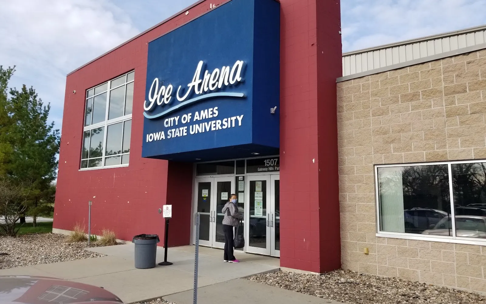 The Ice Arena entrance, signed City of Ames and Iowa State University, on Gateway Hills Park Drive — Ames/ISU Ice Arena