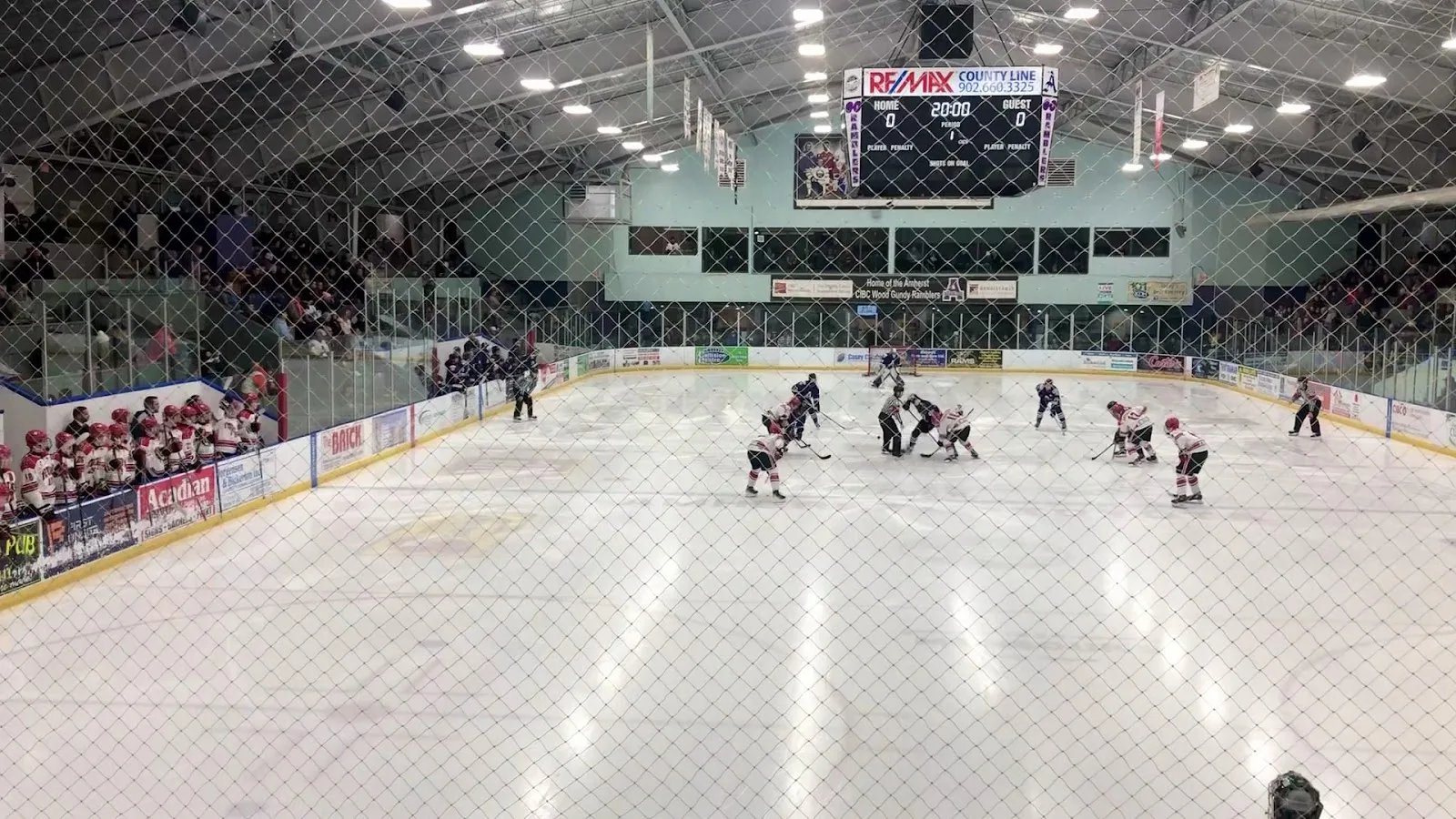 A game on the ice at Amherst Stadium, seen from behind the glass (Google Maps listing photo) — Amherst Stadium
