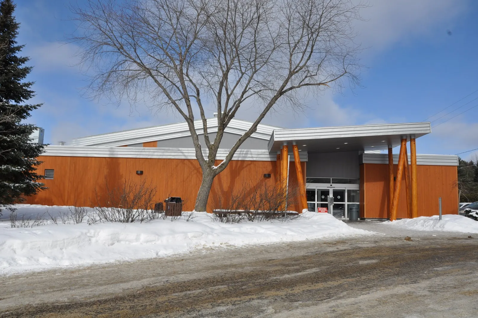 The orange-clad Aréna Gilles-Cadieux building in winter — Aréna Gilles-Cadieux
