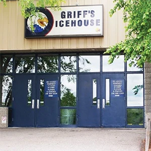 Blue double doors beneath the Griff’s IceHouse sign at the Belknap Park entrance. — Griff's IceHouse Belknap