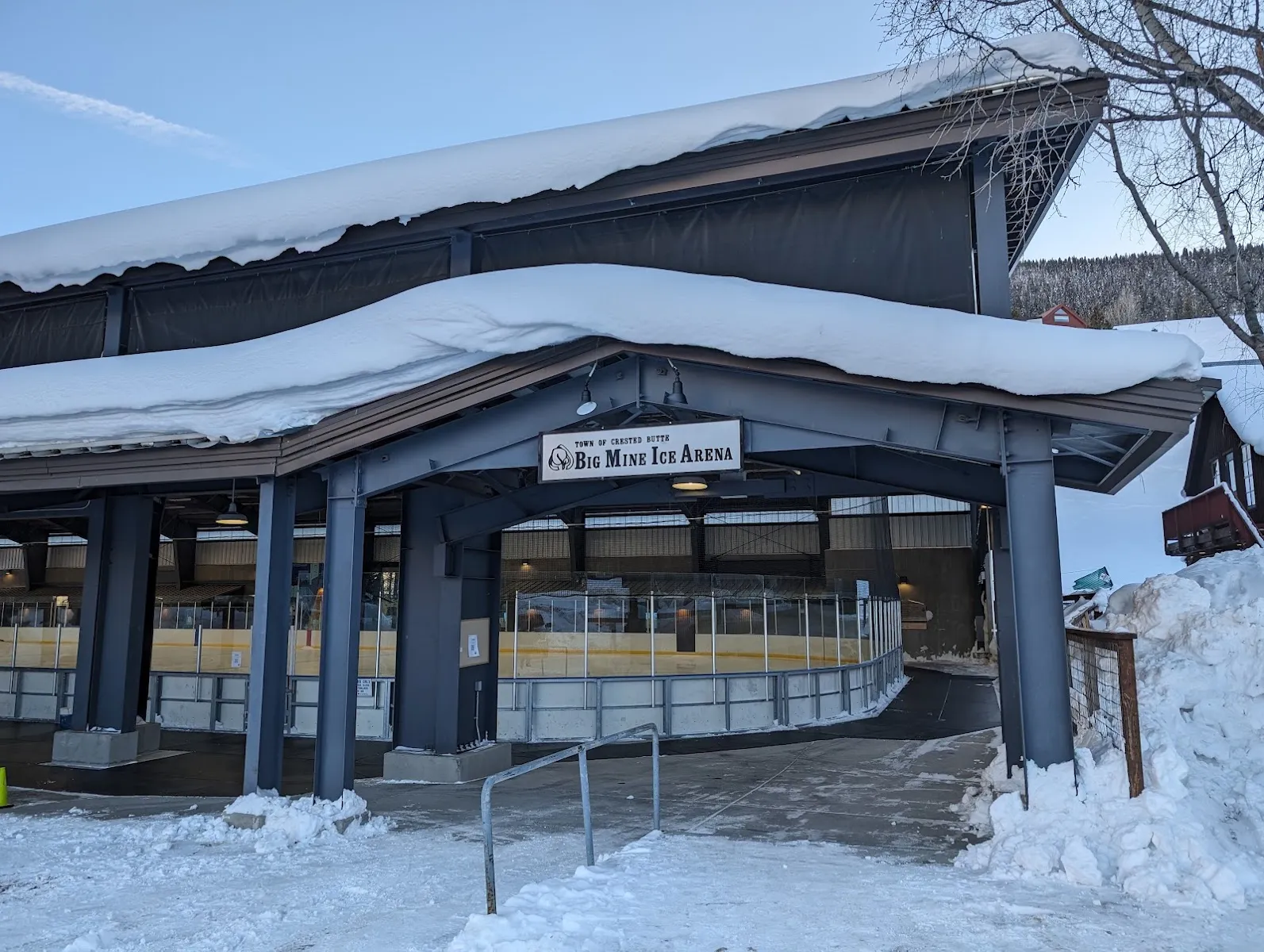 The covered entrance of the Big Mine Ice Arena in Crested Butte in winter — Big Mine Ice Arena
