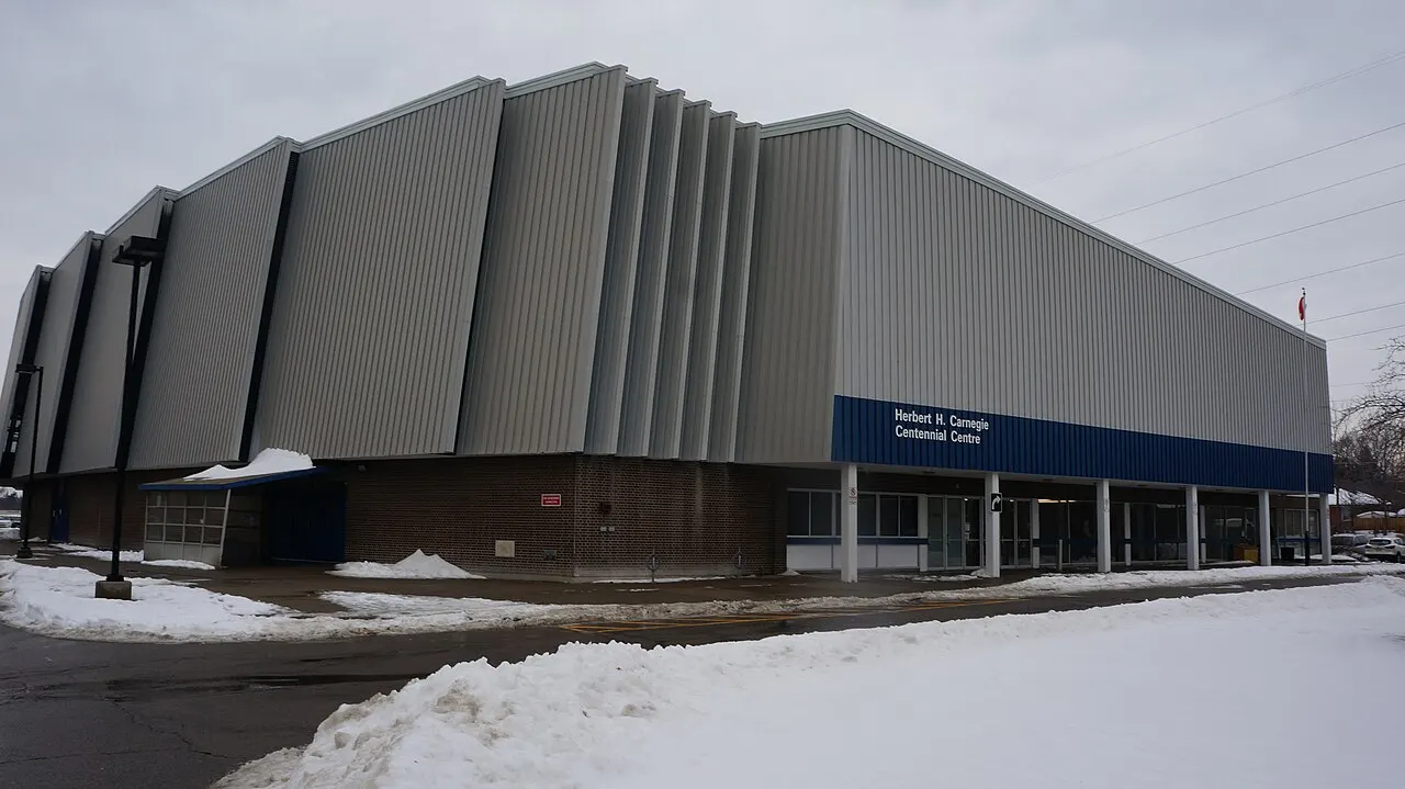 The signed entrance of Herbert H. Carnegie Centennial Centre in winter. — Herbert H. Carnegie Centennial Centre