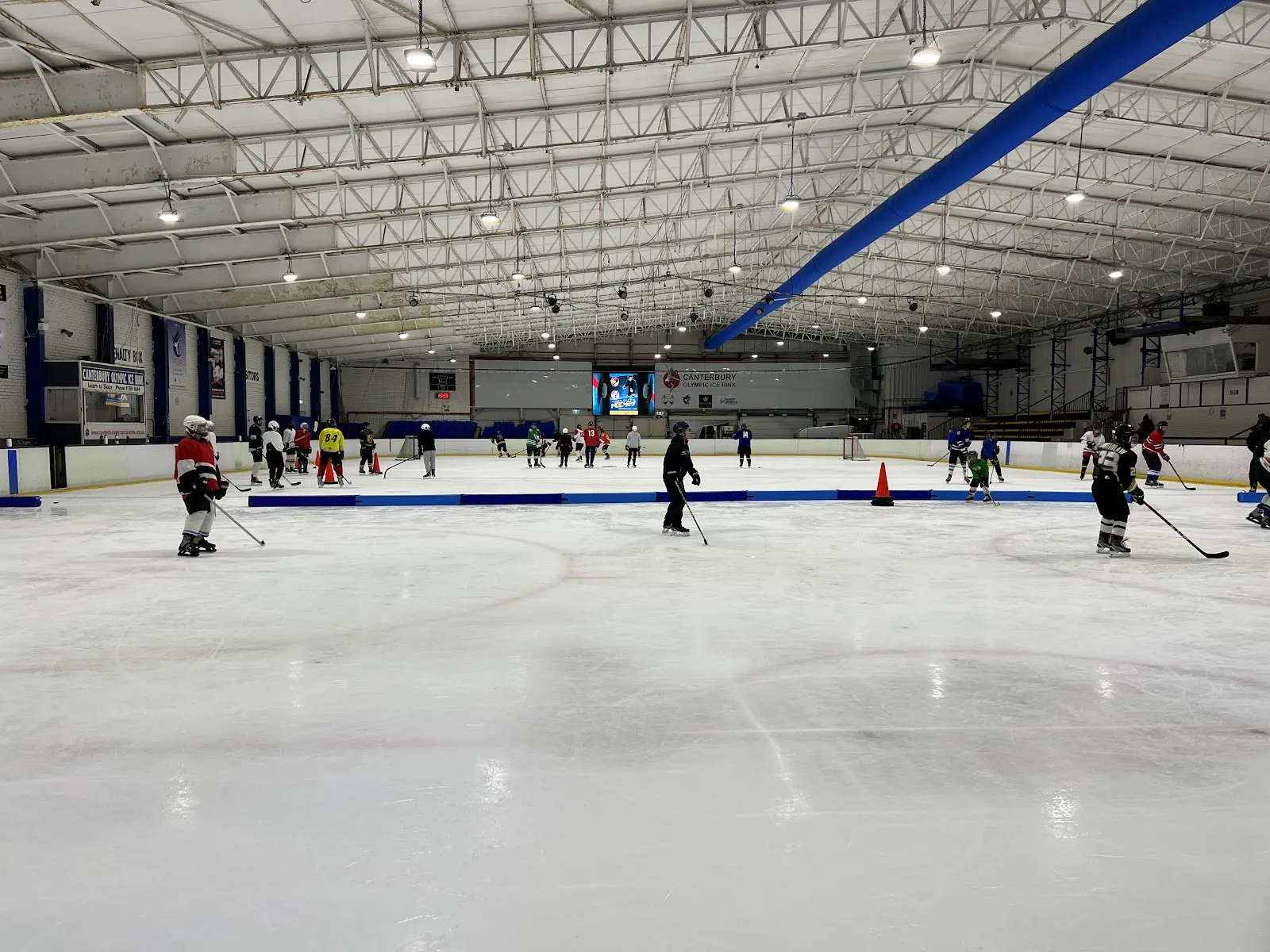 The old rink hall with a practice session on the ice, before the rebuild — Canterbury Olympic Ice Rink