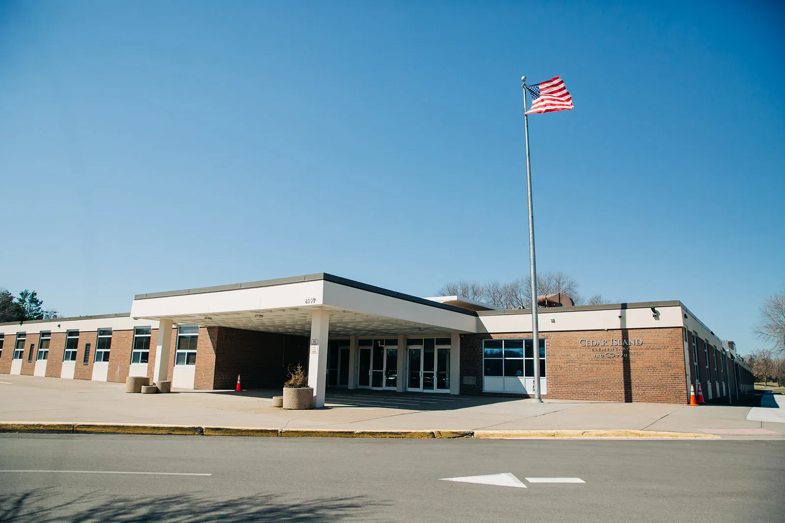 Cedar Island Elementary School, whose grounds hold the outdoor rink, in a photo from its Google Maps listing. — Cedar Island Elementary School Outdoor Rink