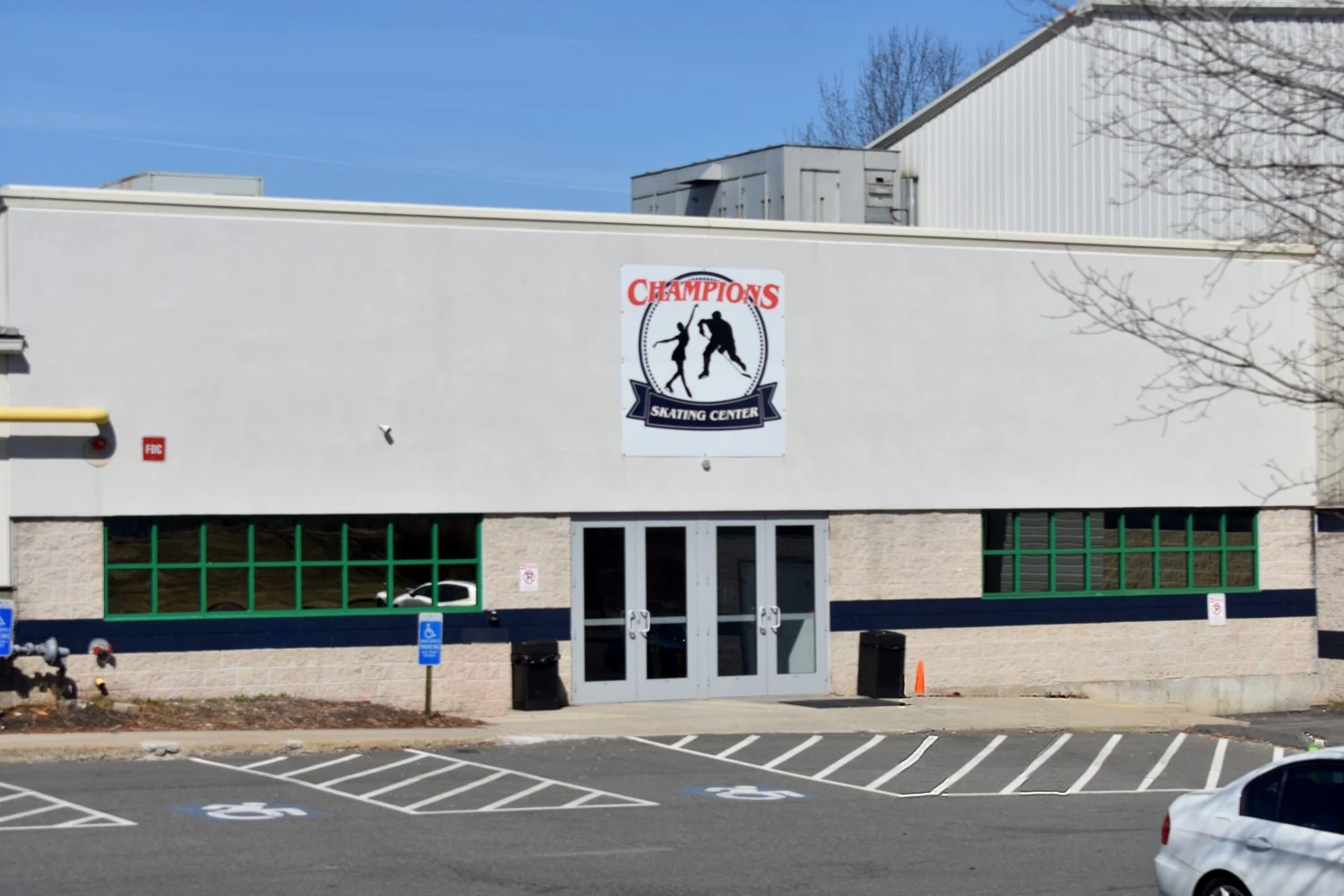 Champions Skating Center's front entrance, photographed in March 2025. — Champions Skating Center