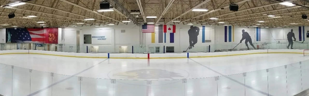 Freshly resurfaced sheet of ice at the Chaska Community Center arena — Chaska Community Center Ice Rink
