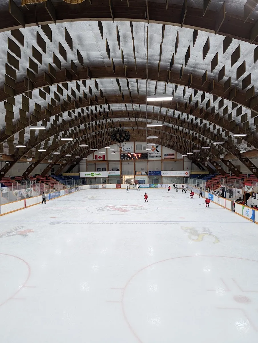 Kimberley Civic Centre Arena ice and arched wooden roof during a game, seen from the end of the rink — Civic Centre Arena