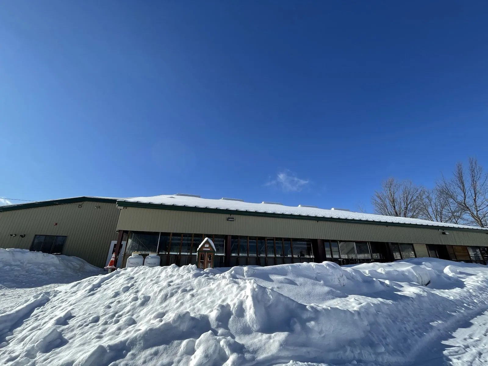 The Colton pavilion and ice-rink building in winter, South Colton — Colton Ice Rink at Swift Field