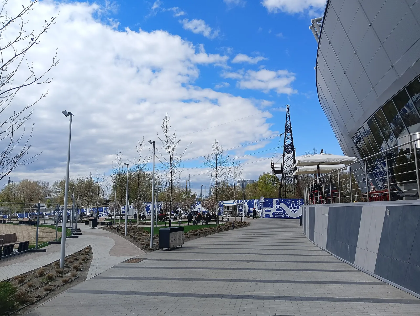 River Mall and the Dnipro embankment promenade, where the Crystal Rink is built each winter (April 2026) — Crystal Rink at River Mall (Кришталева ковзанка)