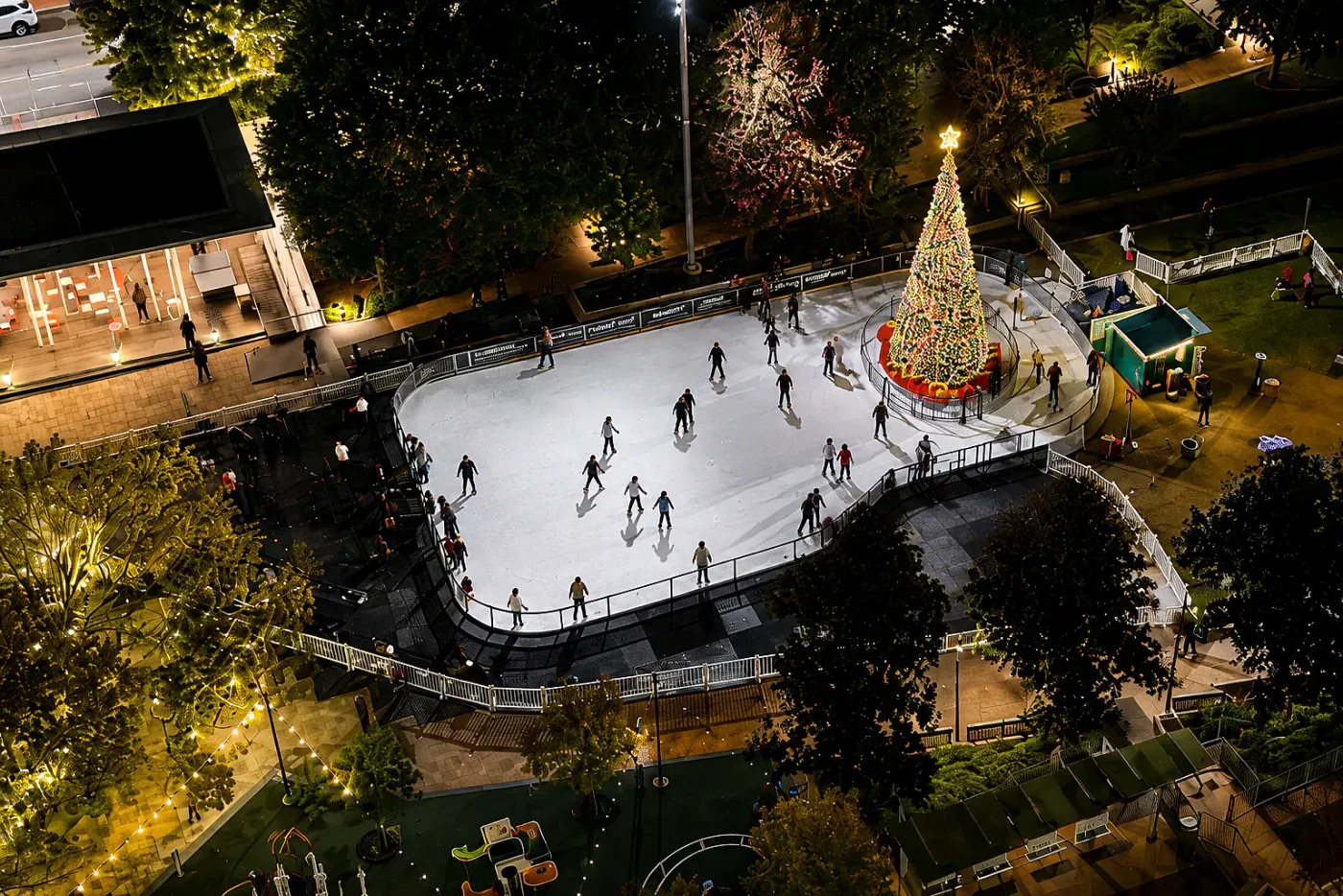 Aerial view of the CultureMap City Rink in Main Street Garden with the holiday tree (CultureMap City Rink website) — CultureMap City Rink