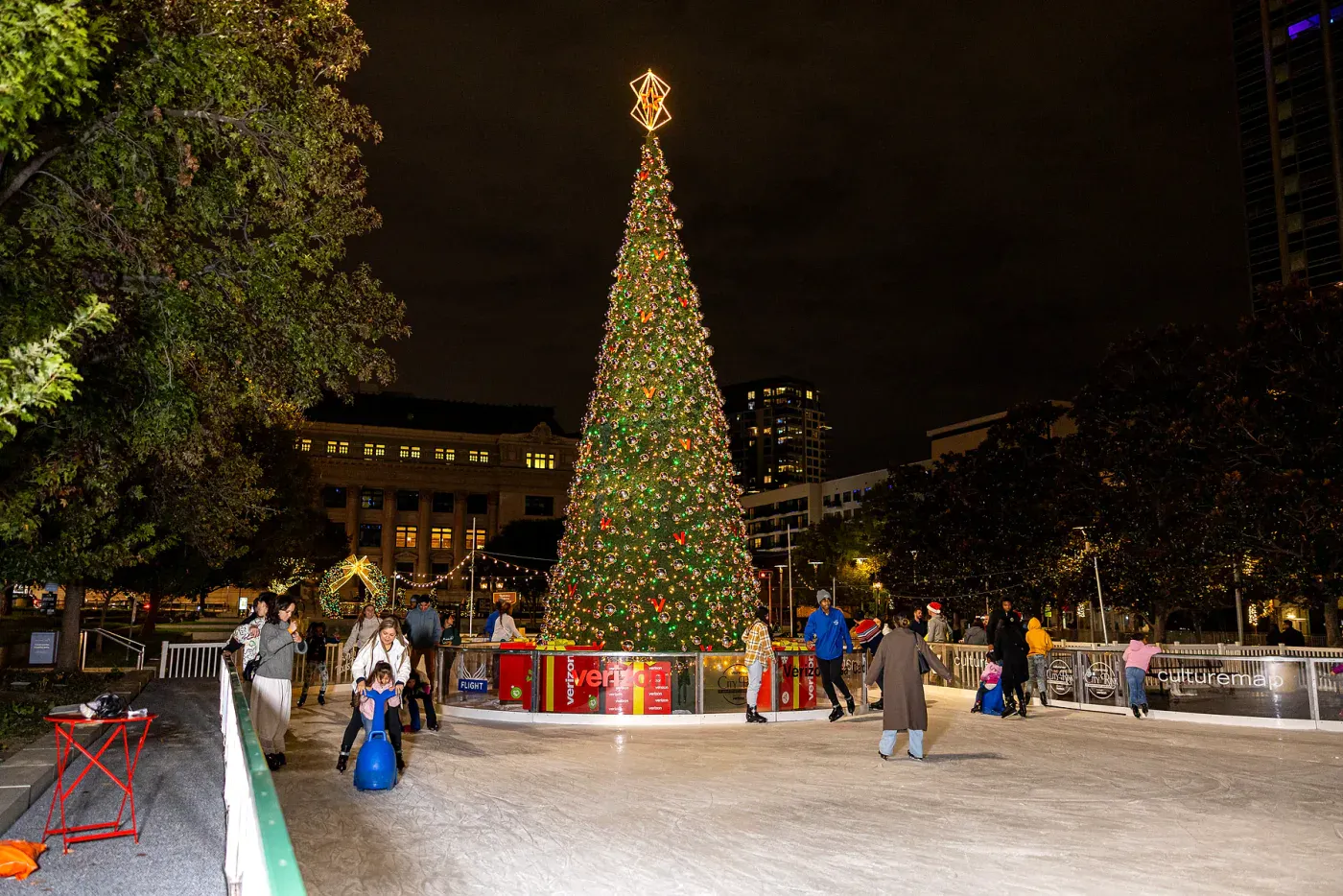 The ice at the CultureMap City Rink at night with the holiday tree (CultureMap City Rink website) — CultureMap City Rink