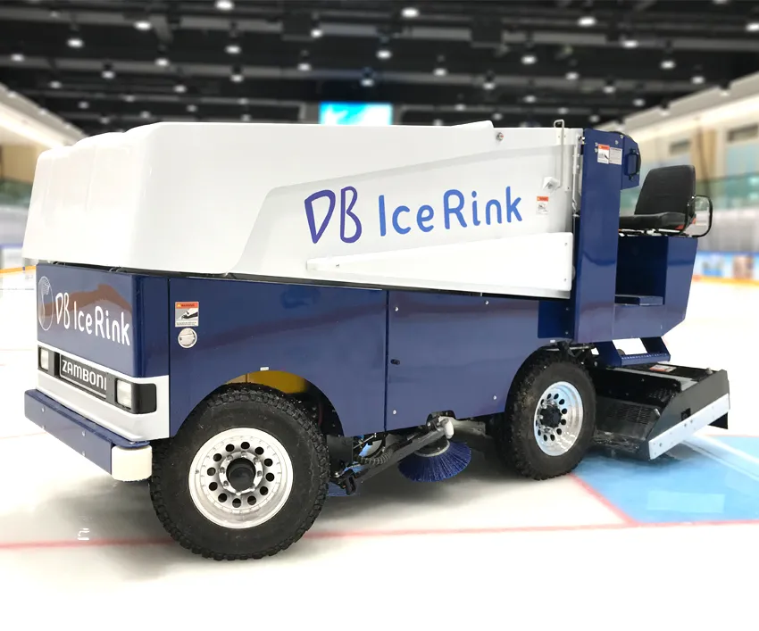 The DB Ice Rink electric ice resurfacer on the ice inside the rink hall, with the boards and roof lights behind (photo published on the rink's own site). — DB Ice Rink
