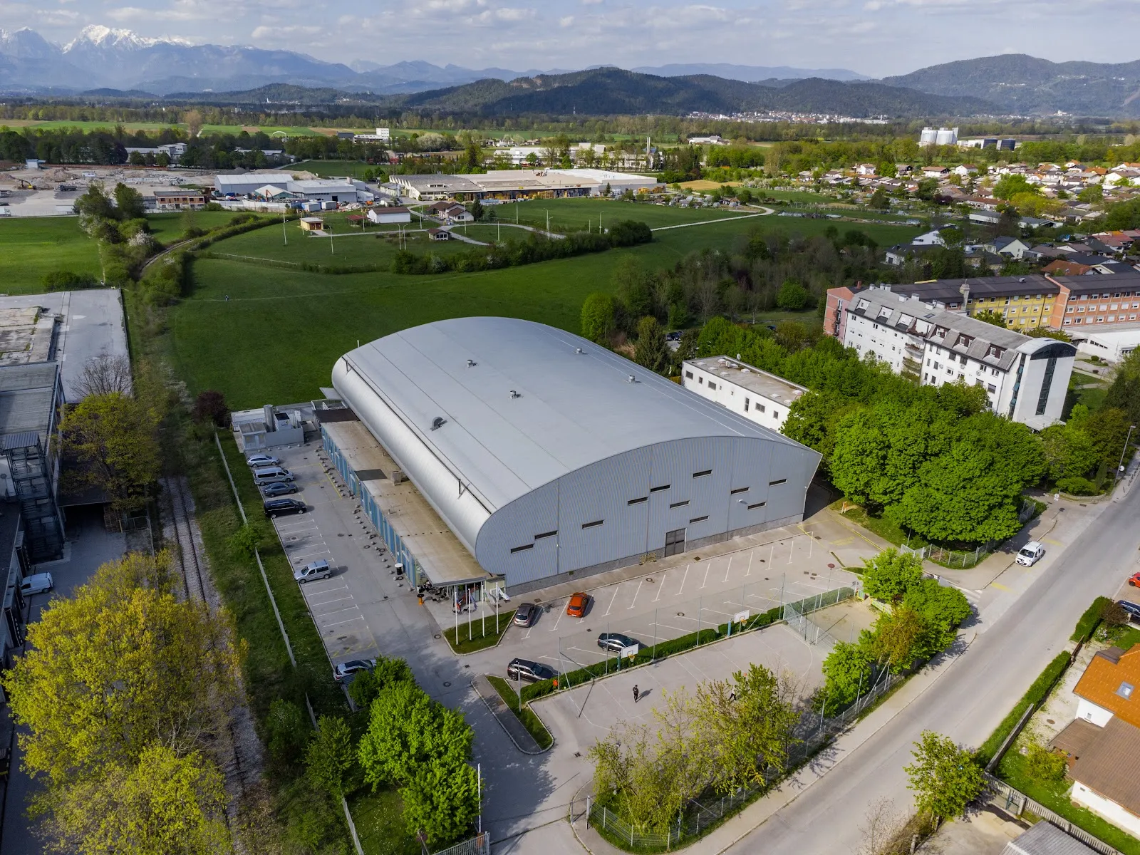 Aerial view of the barrel-roofed Dvorana Zalog in Ljubljana's Polje district — Dvorana Zalog