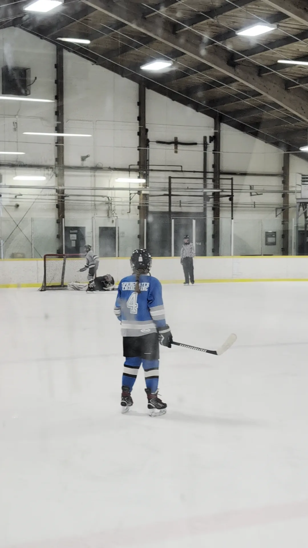 A hockey player on the ice in the arena at Eastview Arena, Barrie — Eastview Arena