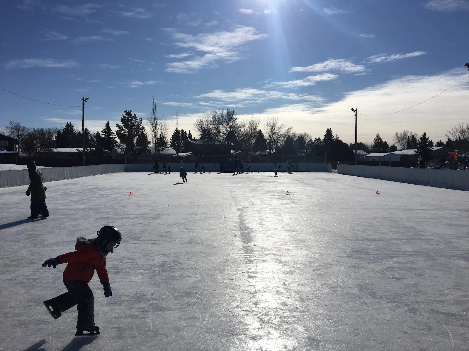 A child skating on the Future Stars Arena outdoor rink, Ecole River Heights School (Google Maps listing photo) — École River Heights School Outdoor Rink (River Heights)