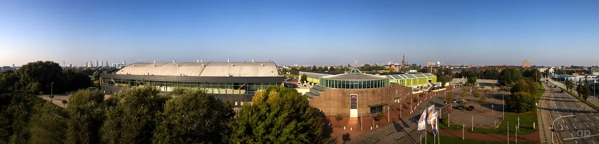The Eisarena Bremerhaven among the buildings of the Stadthalle quarter. — Eisarena Bremerhaven