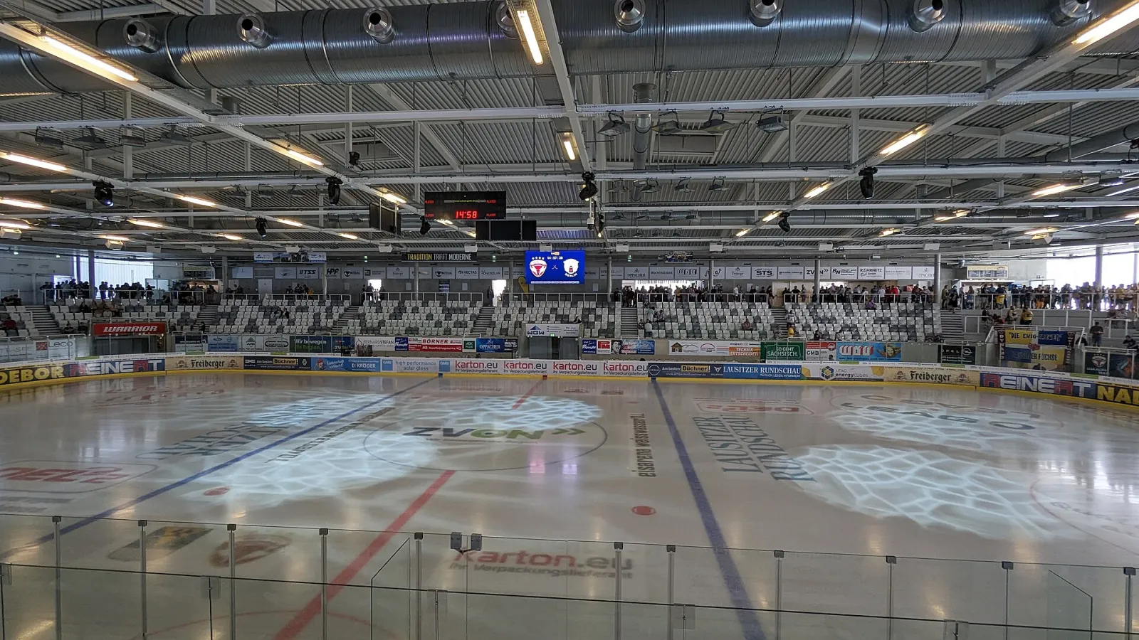 The ice surface and stands of the Eisarena Weißwasser before a Lausitzer Füchse preseason game in August 2023 — Eisarena Weißwasser
