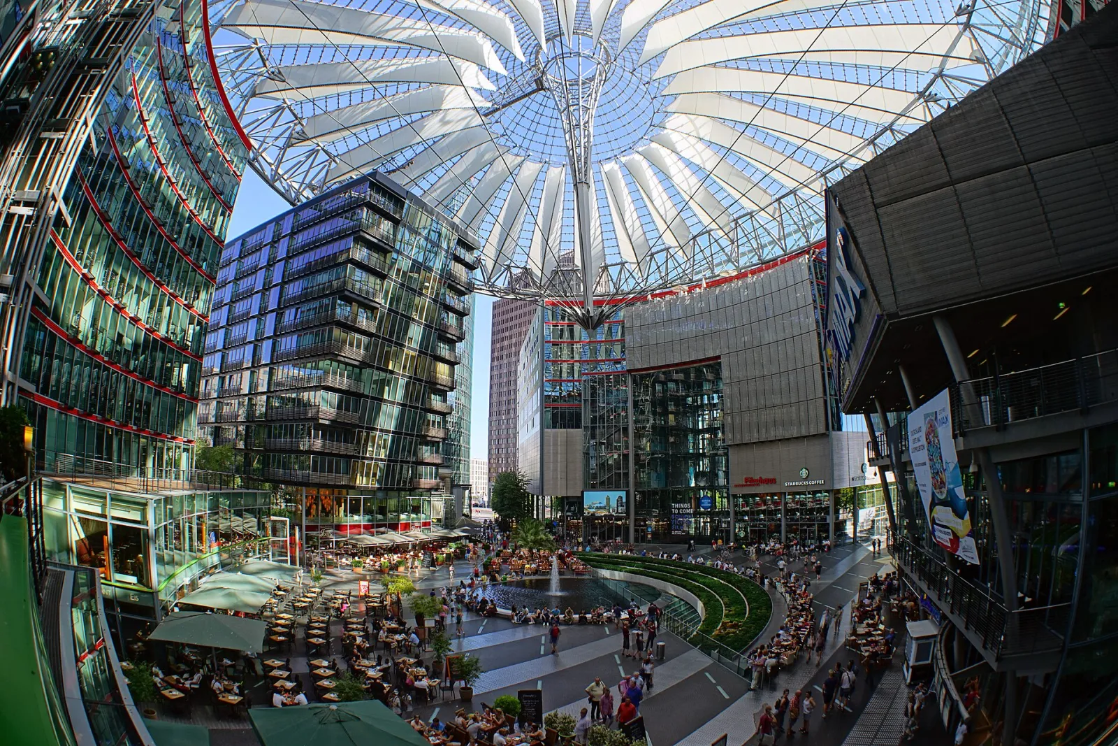 The Forum of the Center at Potsdamer Platz (the former Sony Center) under its fanned tent roof — Eisbahn im Center am Potsdamer Platz