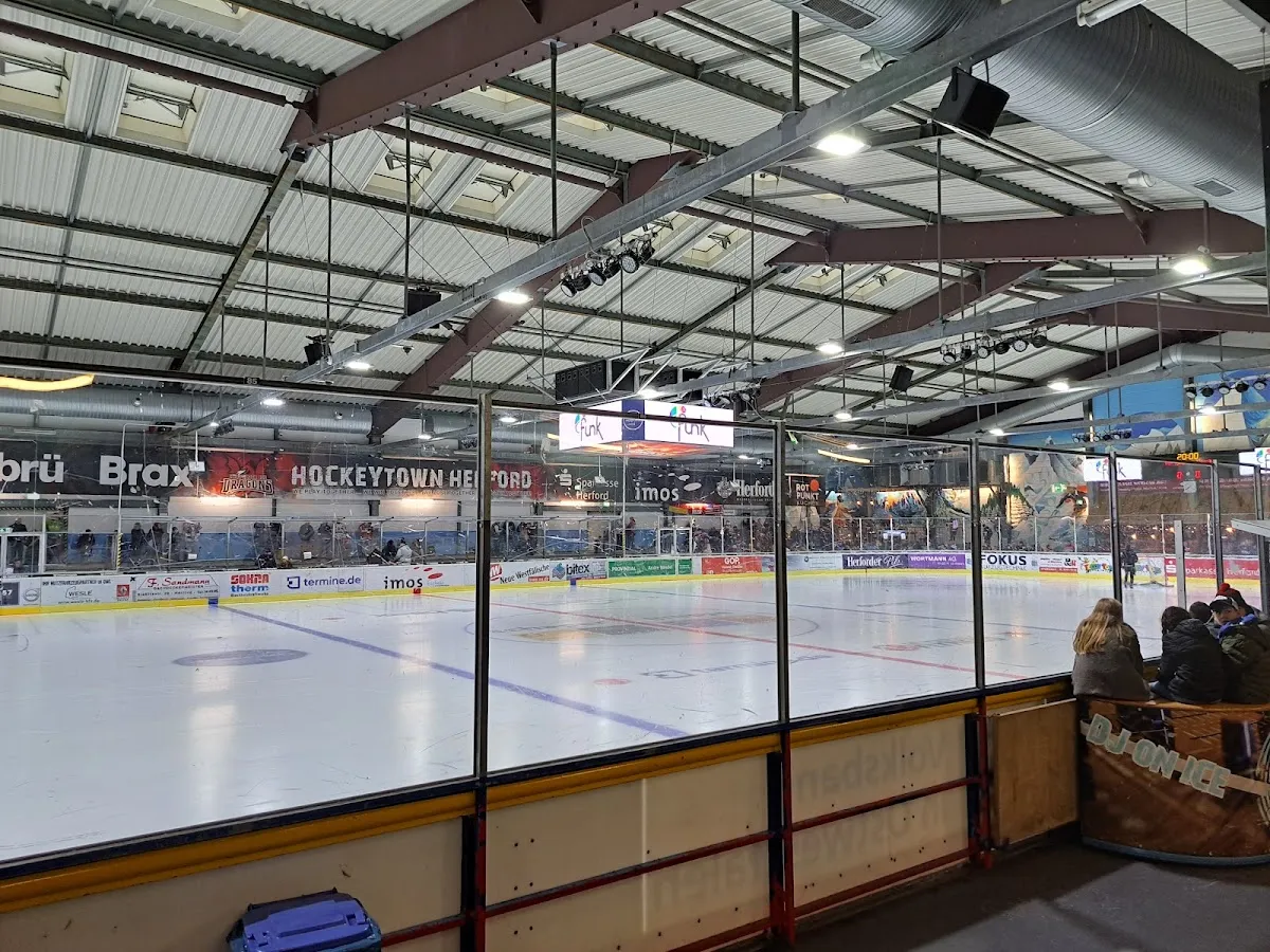 The ice of the Eishalle Herford seen from the rink side. — Eishalle Herford