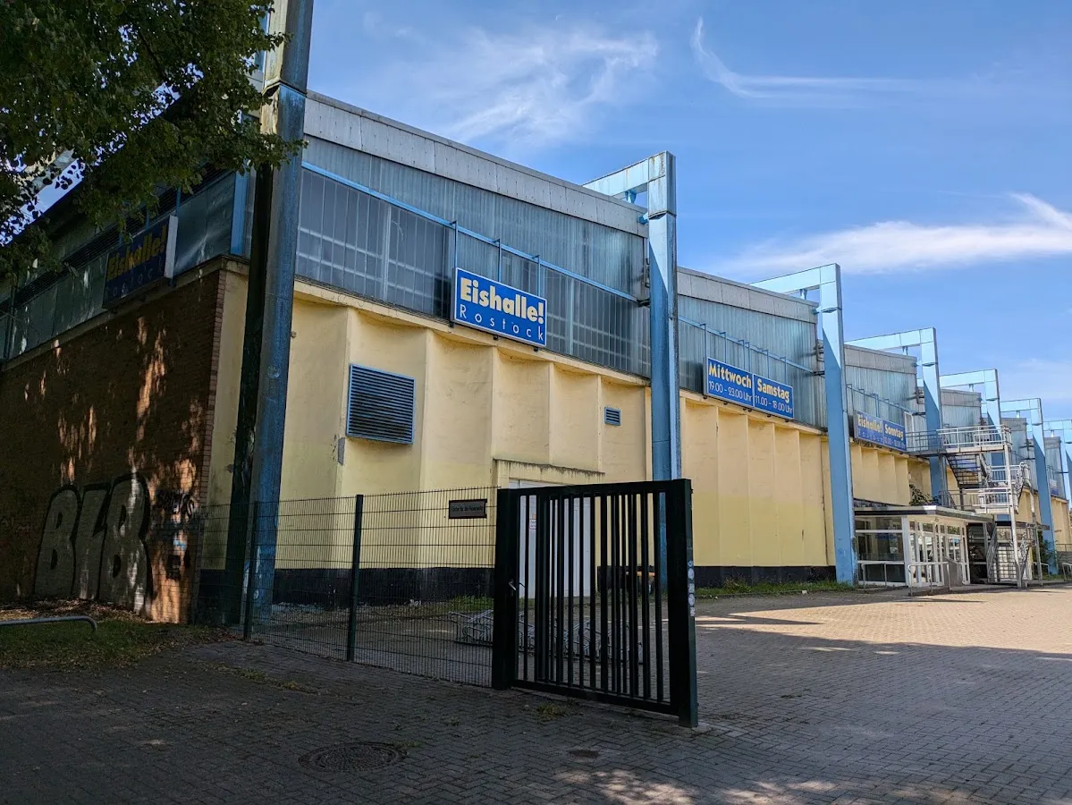 The Eishalle Rostock building with its blue-framed glass front. — Eishalle Rostock