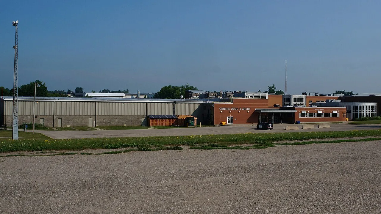 The Erin Community Centre (Centre 2000 and Arena) seen across its parking area. — Erin Community Centre