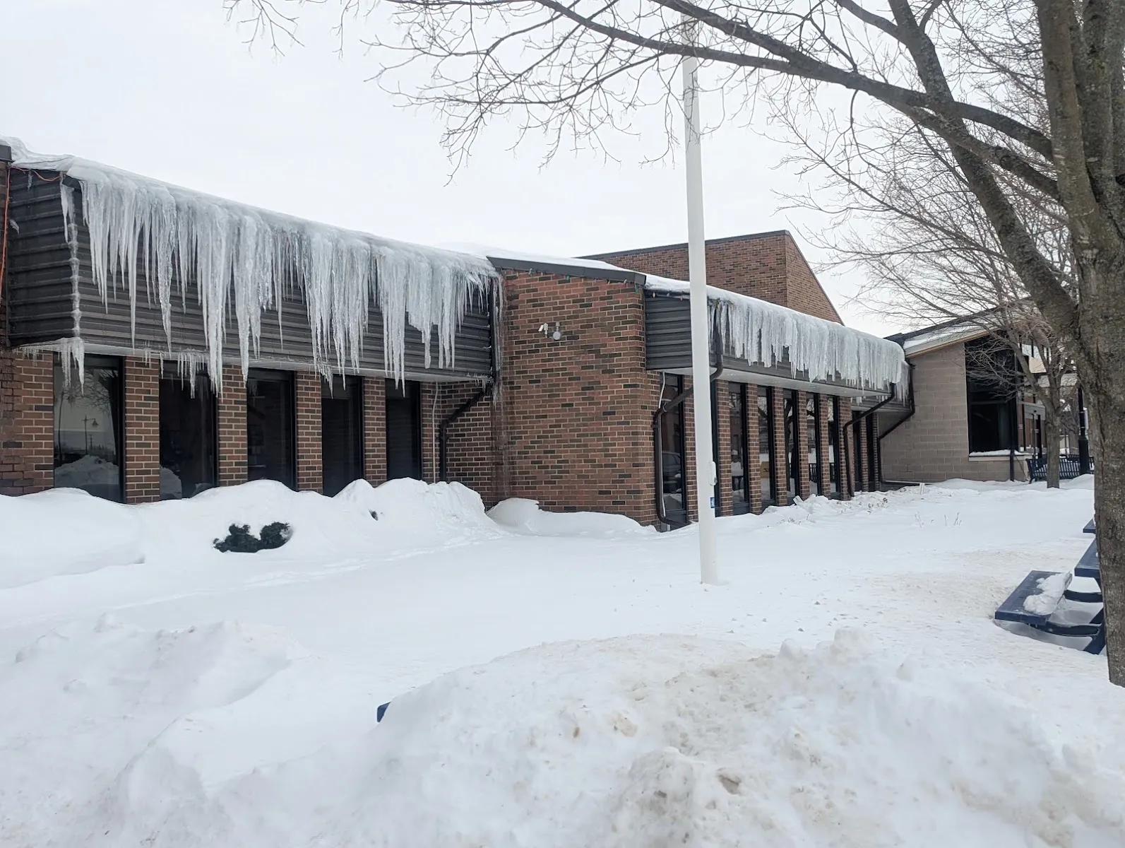 The outside of Flower City Community Campus Outdoor Skating Rink, in a photo from its Google Maps listing. — Flower City Community Campus Outdoor Skating Rink