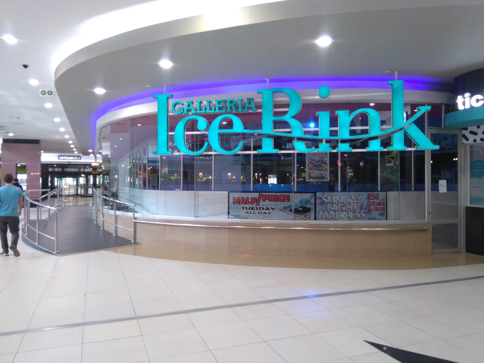 The Ice Rink sign and ticket desk at the entrance of the Galleria Ice Rink inside the mall — Galleria Mall Ice Rink