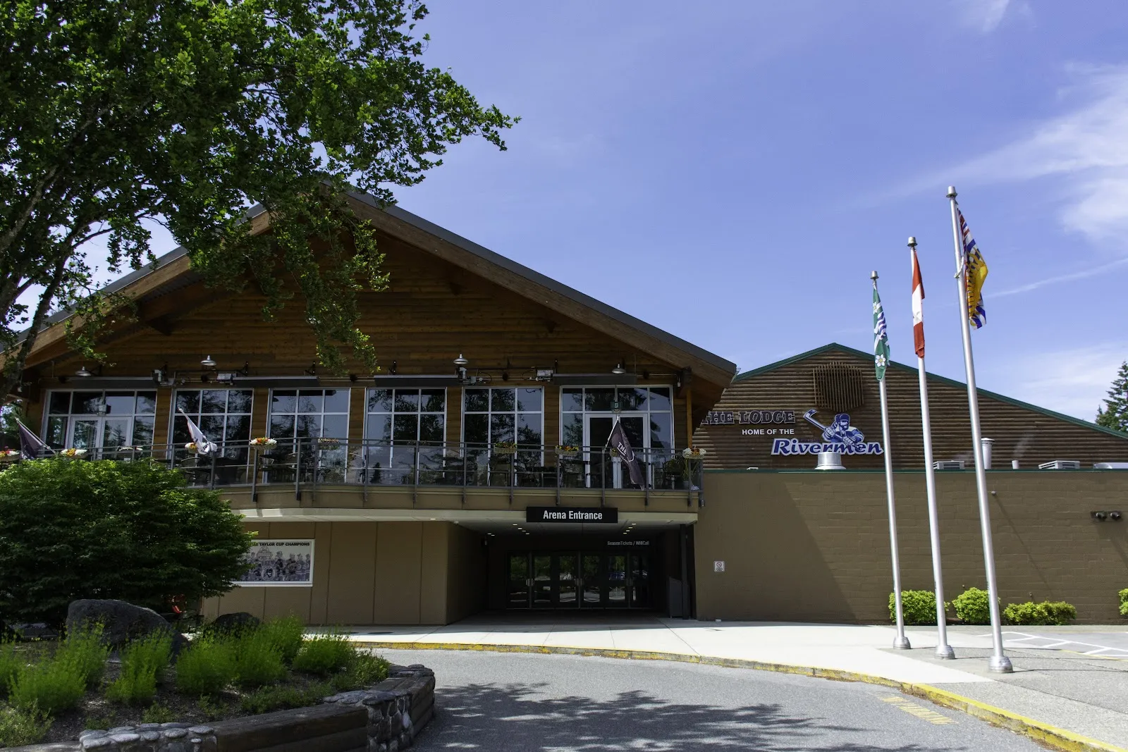 George Preston Recreation Centre arena entrance with flagpoles — George Preston Recreation Centre