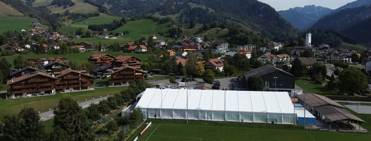 The tent of the GESA Arena at the Val-de-Charmey sports centre, seen from above — GESA Arena