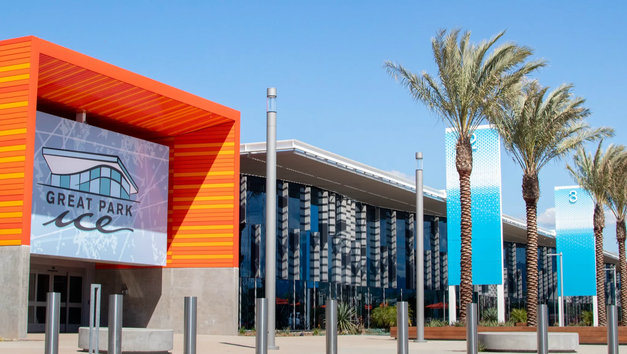 Front of a large modern rink complex — Great Park Ice
