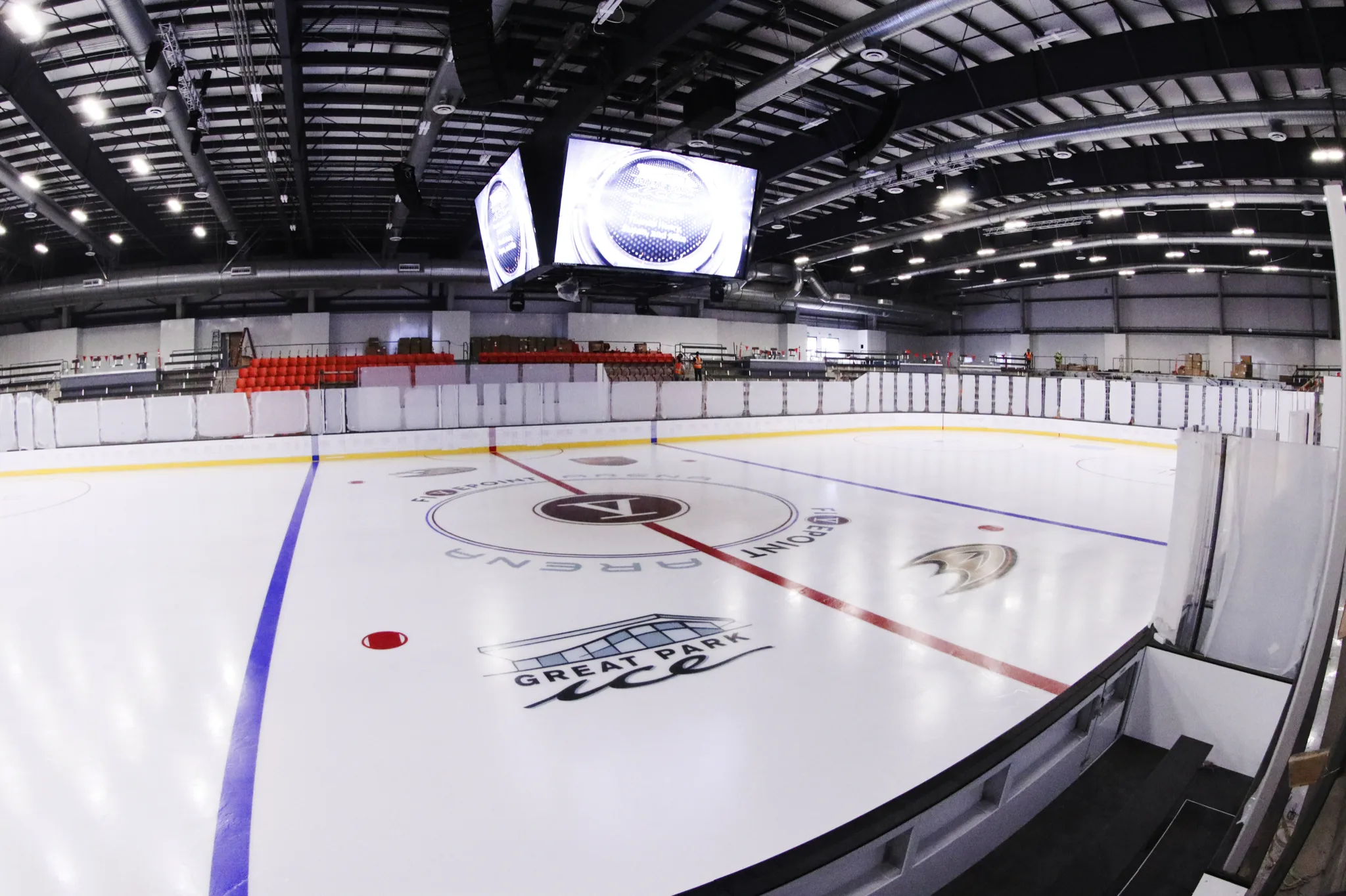 Entire NHL sheet from a corner at boards height — Great Park Ice