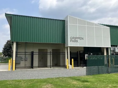 The green-roofed front of the Grippen Community Park building in Endicott, with the park name on the facade — Grippen Community Park Ice Rink