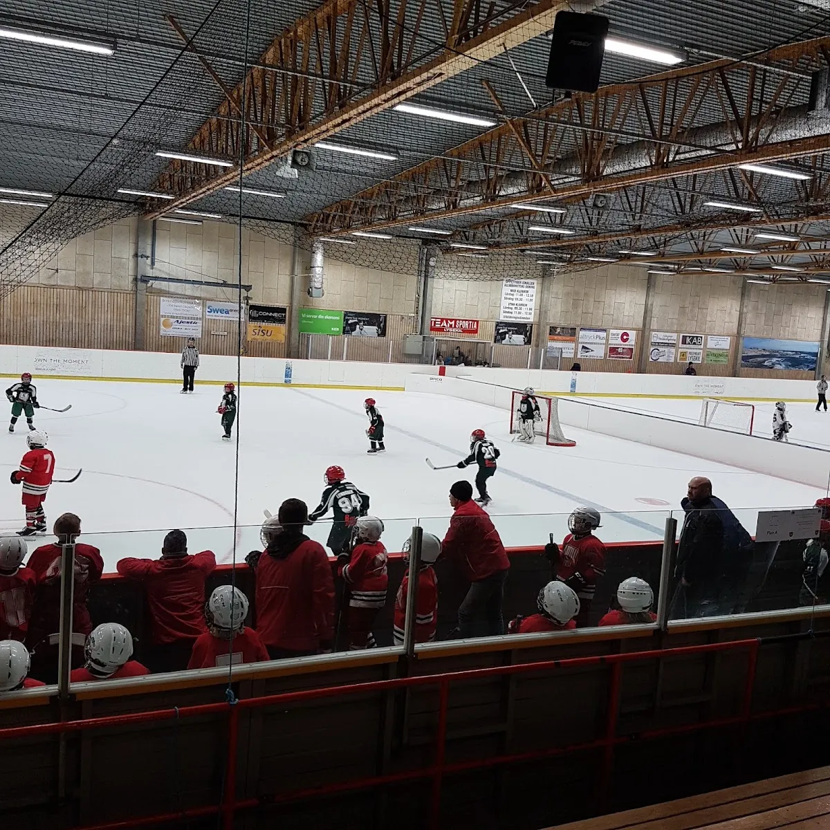 The ice and boards of Gullmarsborgs ishall during a junior game — Gullmarsborgs ishall
