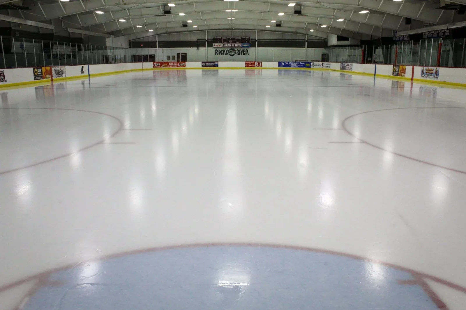 Empty sheet from behind a goal line — Hamilton Ice Arena (Rocky River)