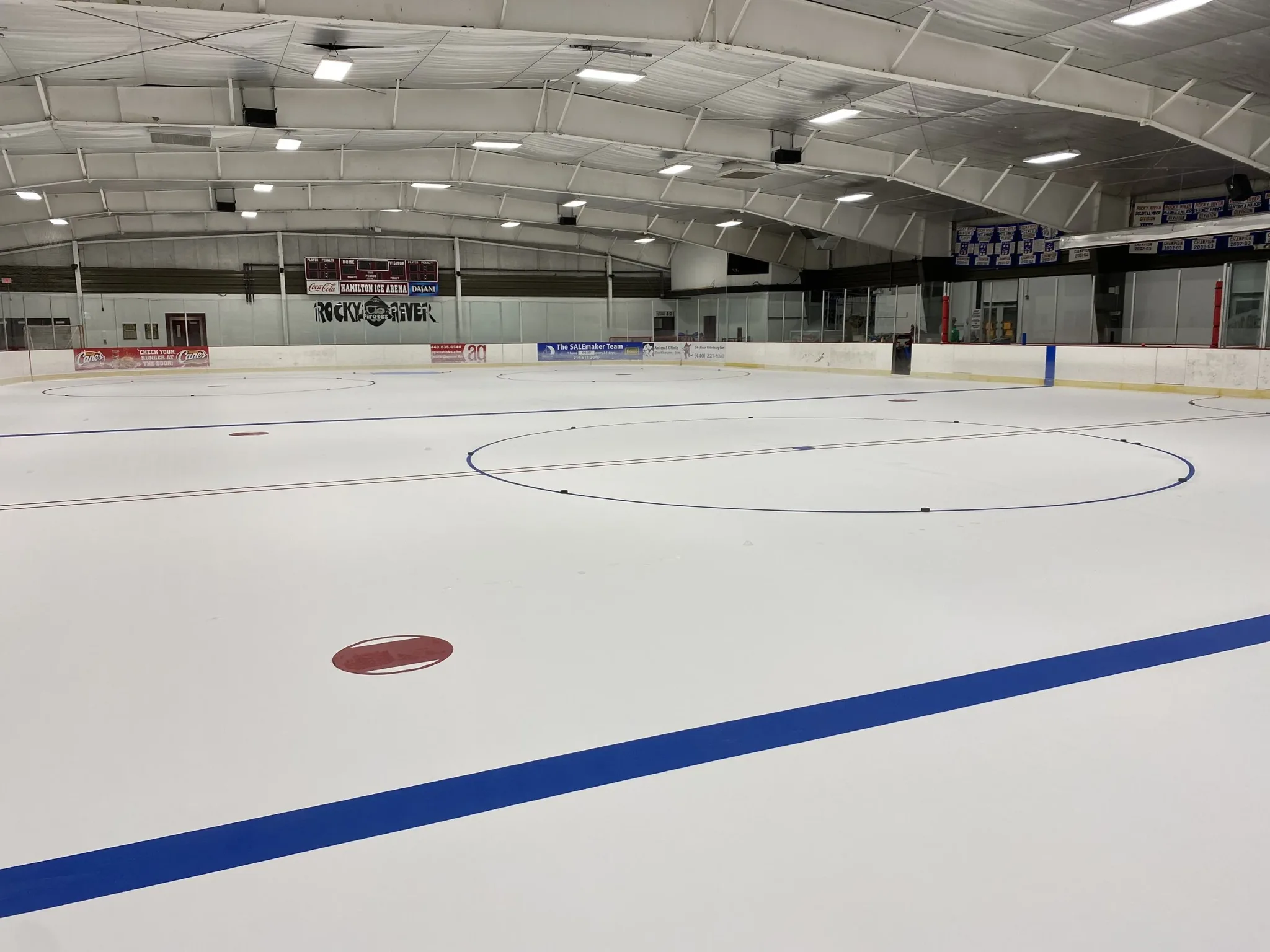 Whole ice sheet shot from ice level near a blue line — Hamilton Ice Arena (Rocky River)