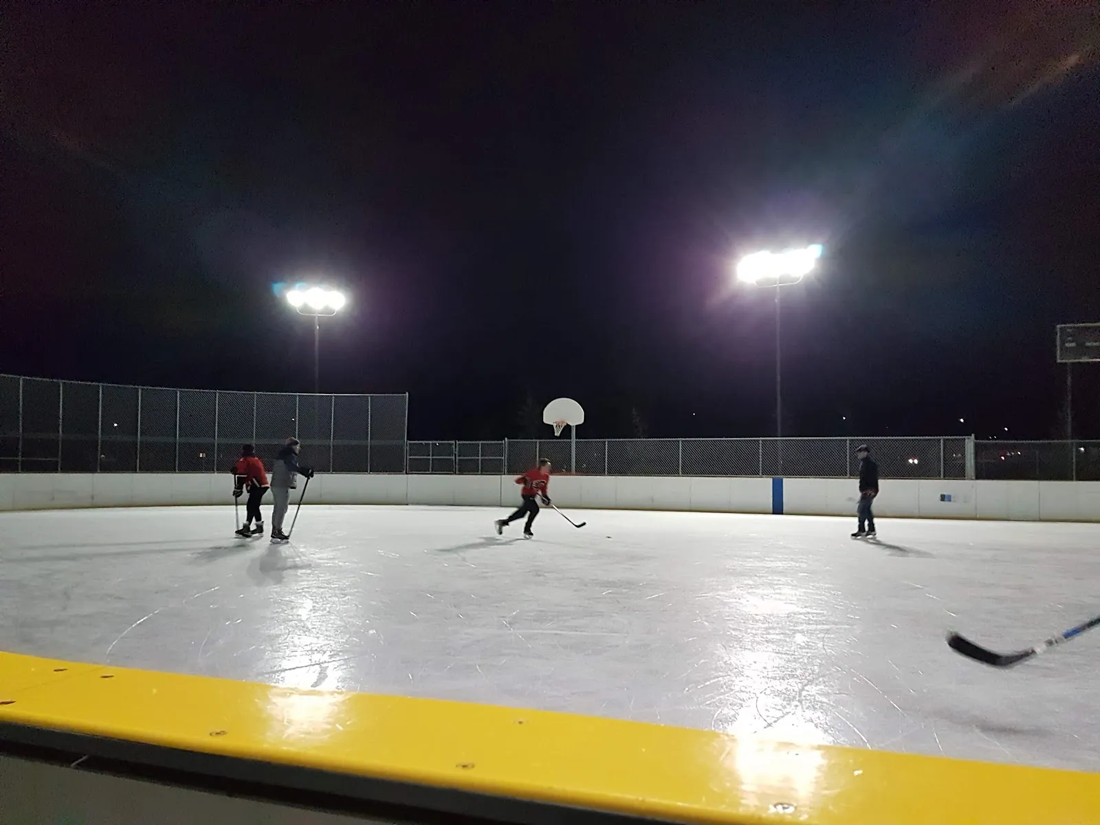 The ice at Hamptons Community Pleasure Rink (10370 Hamptons Blvd N.W.), in a photo from its Google Maps listing. — Hamptons Community Pleasure Rink (10370 Hamptons Blvd N.W.)