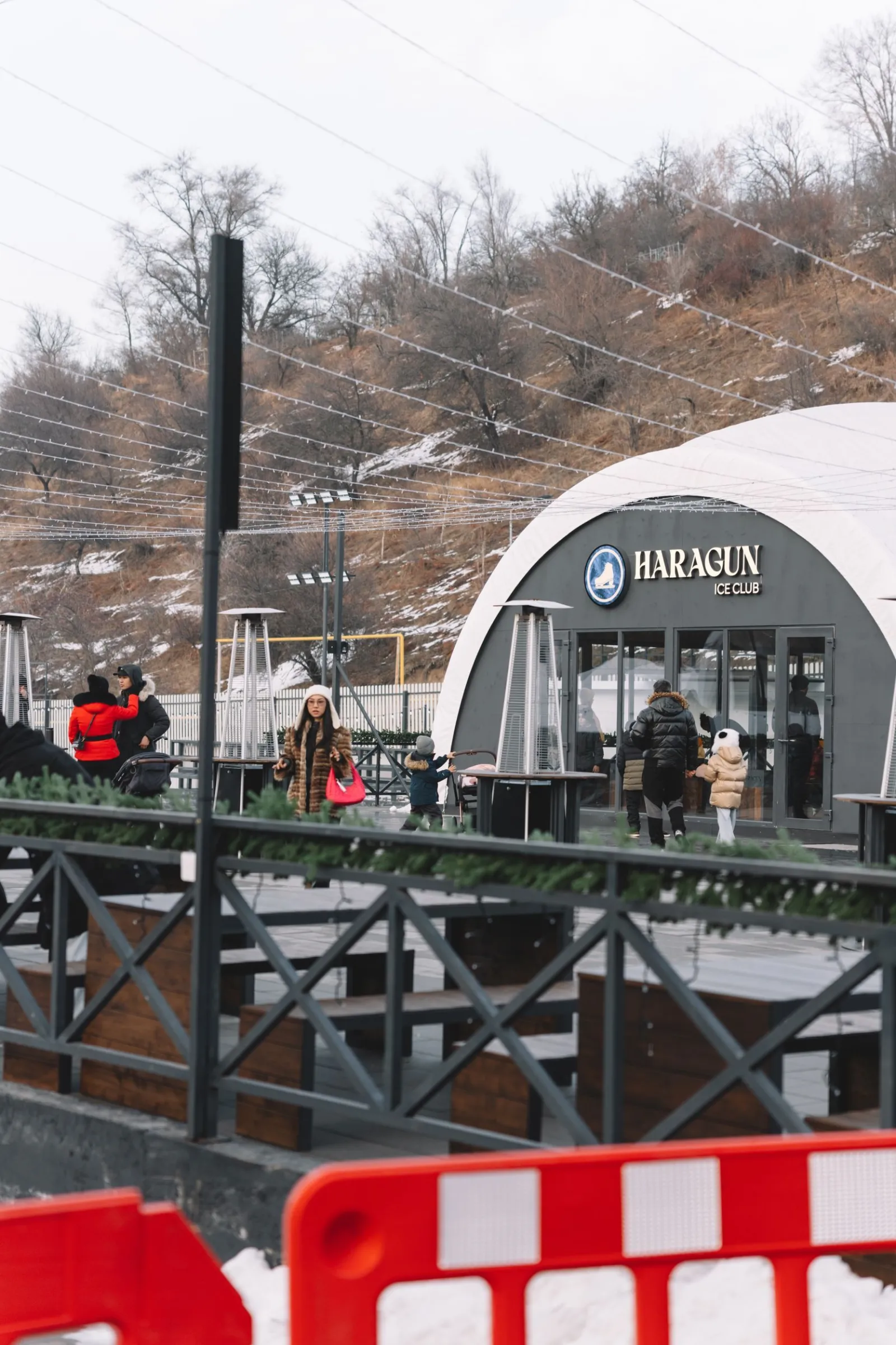 The Haragun Ice Club pavilion beside the rink, in the hills above Almaty — Haragun Ice Club