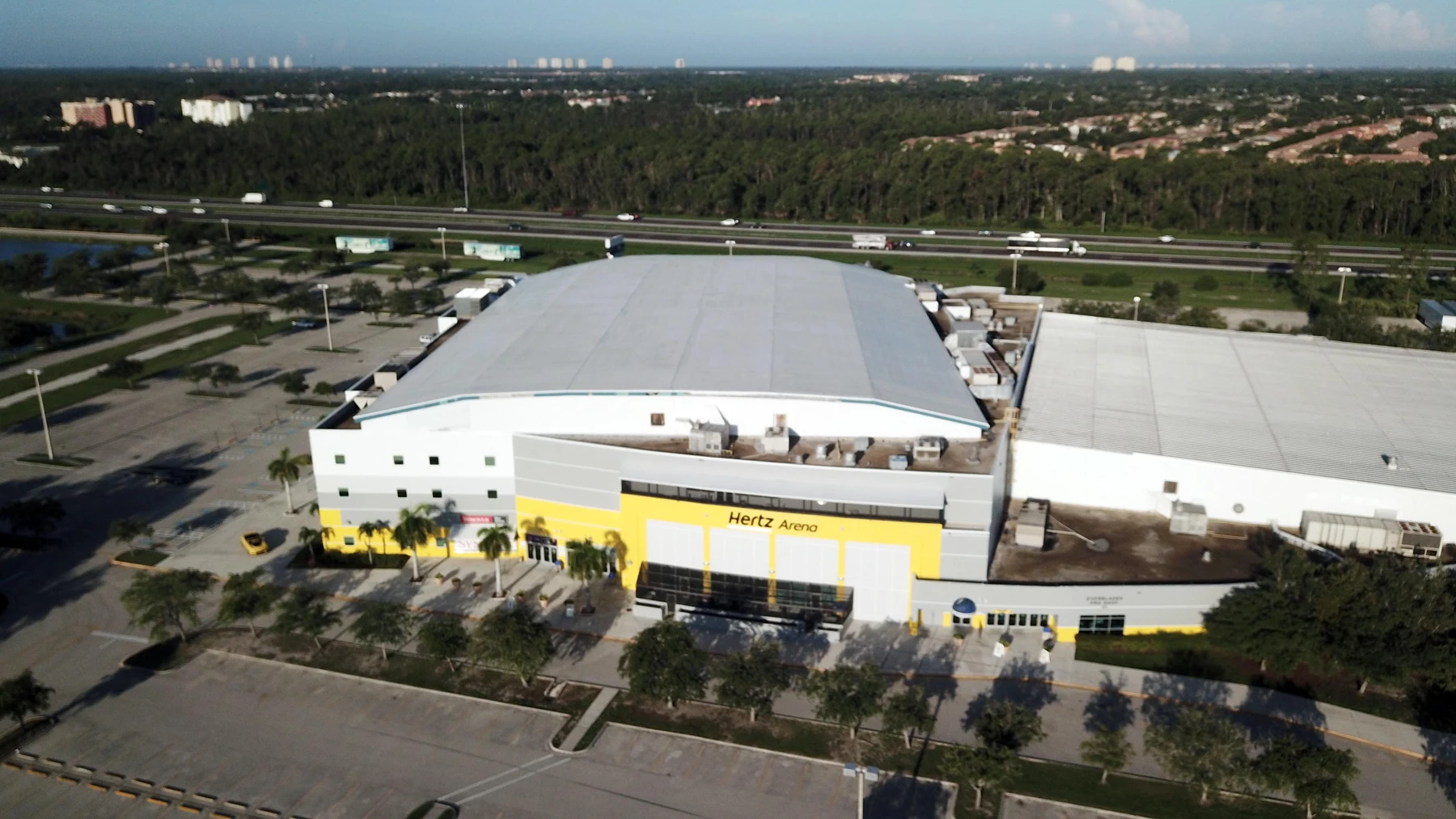 Hertz Arena and its adjoining recreational ice complex, viewed from above the entrance. — Hertz Arena