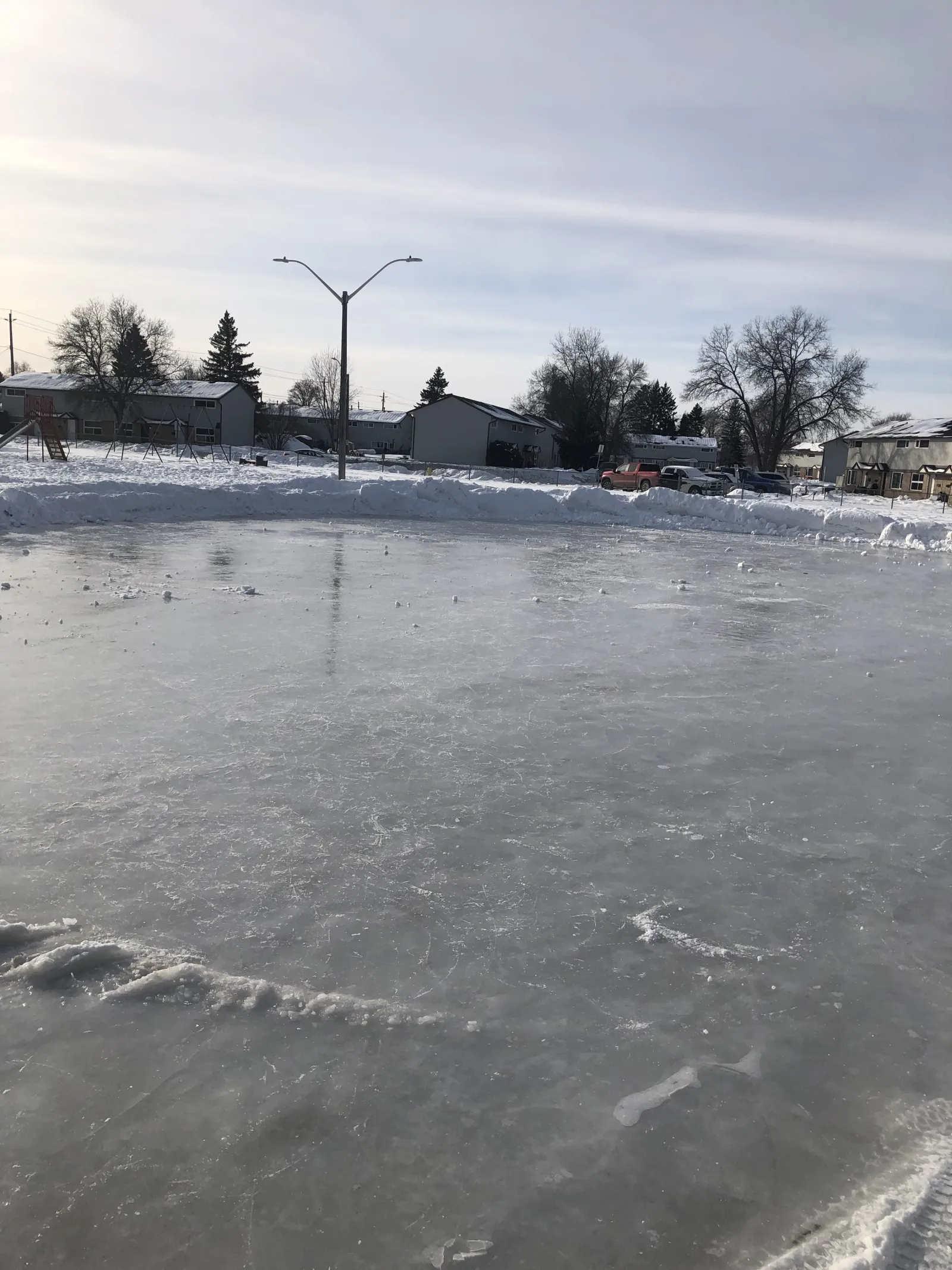 The Holt Parkette skating pond with a smooth sheet of ice — Holt Parkette Skating Pond