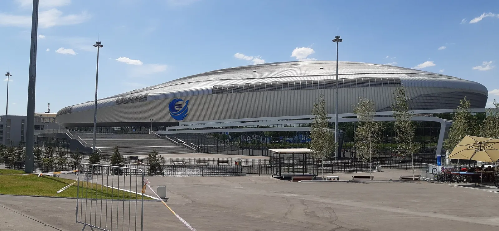 Humo Arena from the plaza: the silver roof of the arena that opened in Tashkent in 2019. — Humo Arena