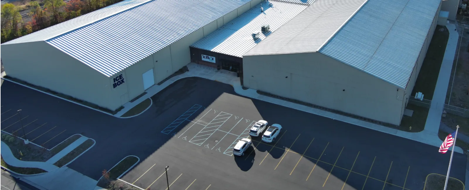 Low aerial of the Ice Box on a bright autumn day — Ice Box Skating Rink