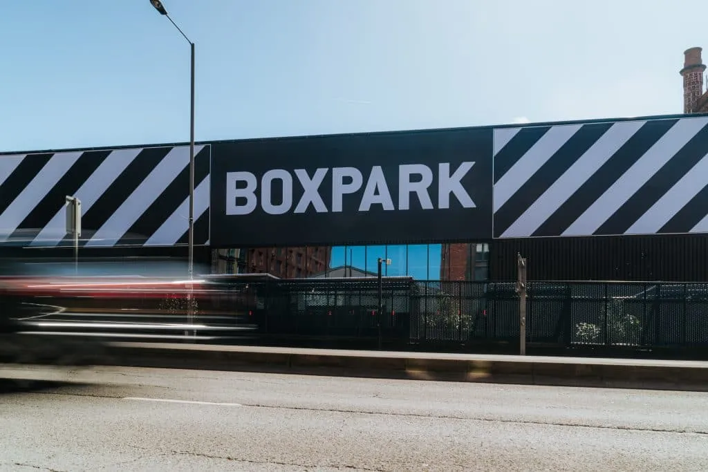 The BOXPARK Liverpool sign on the street front of the venue that hosts the IceBox rink — IceBox at BOXPARK Liverpool