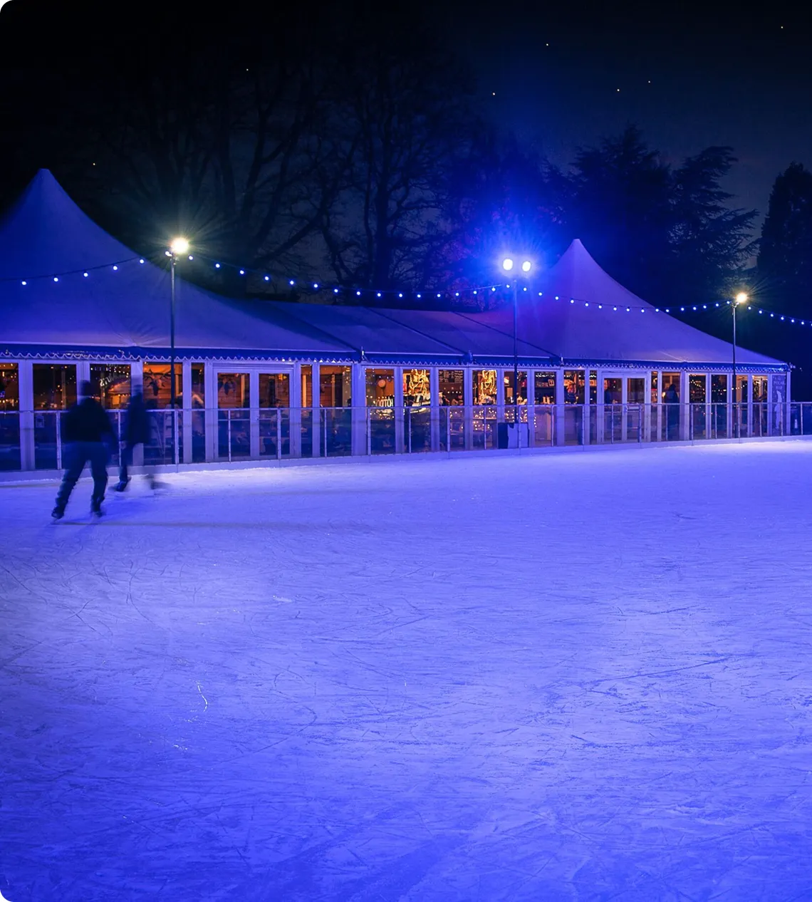 Skaters on the open-air ice beside the pavilion at Calverley Grounds (the operator's photo) — Icescape Tunbridge Wells