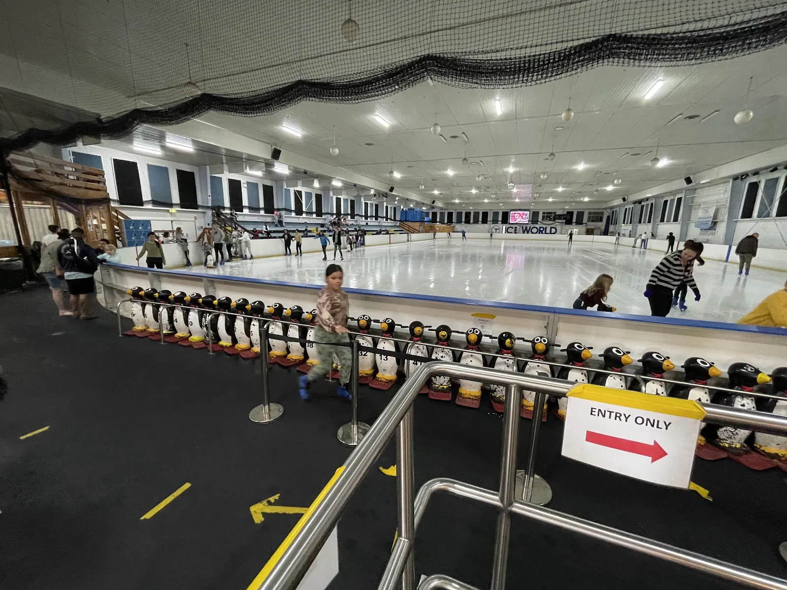 The rink at Iceworld Olympic Ice Rink Acacia Ridge with skate aids lined along the boards — Iceworld Olympic Ice Rink Acacia Ridge