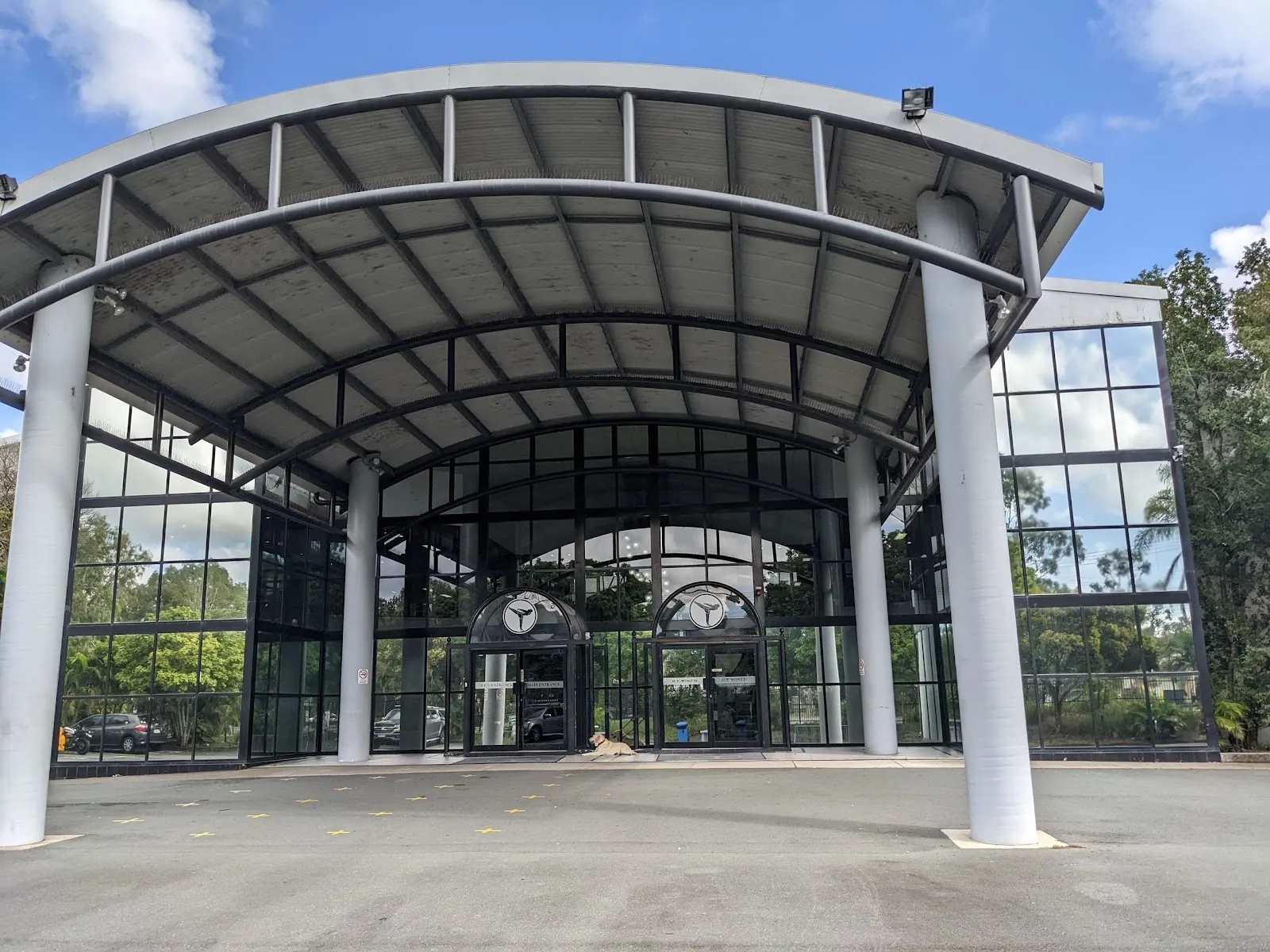 The glass entrance and canopy of Iceworld Olympic Ice Rink on Sandgate Road, Boondall — Iceworld Olympic Ice Rink Boondall