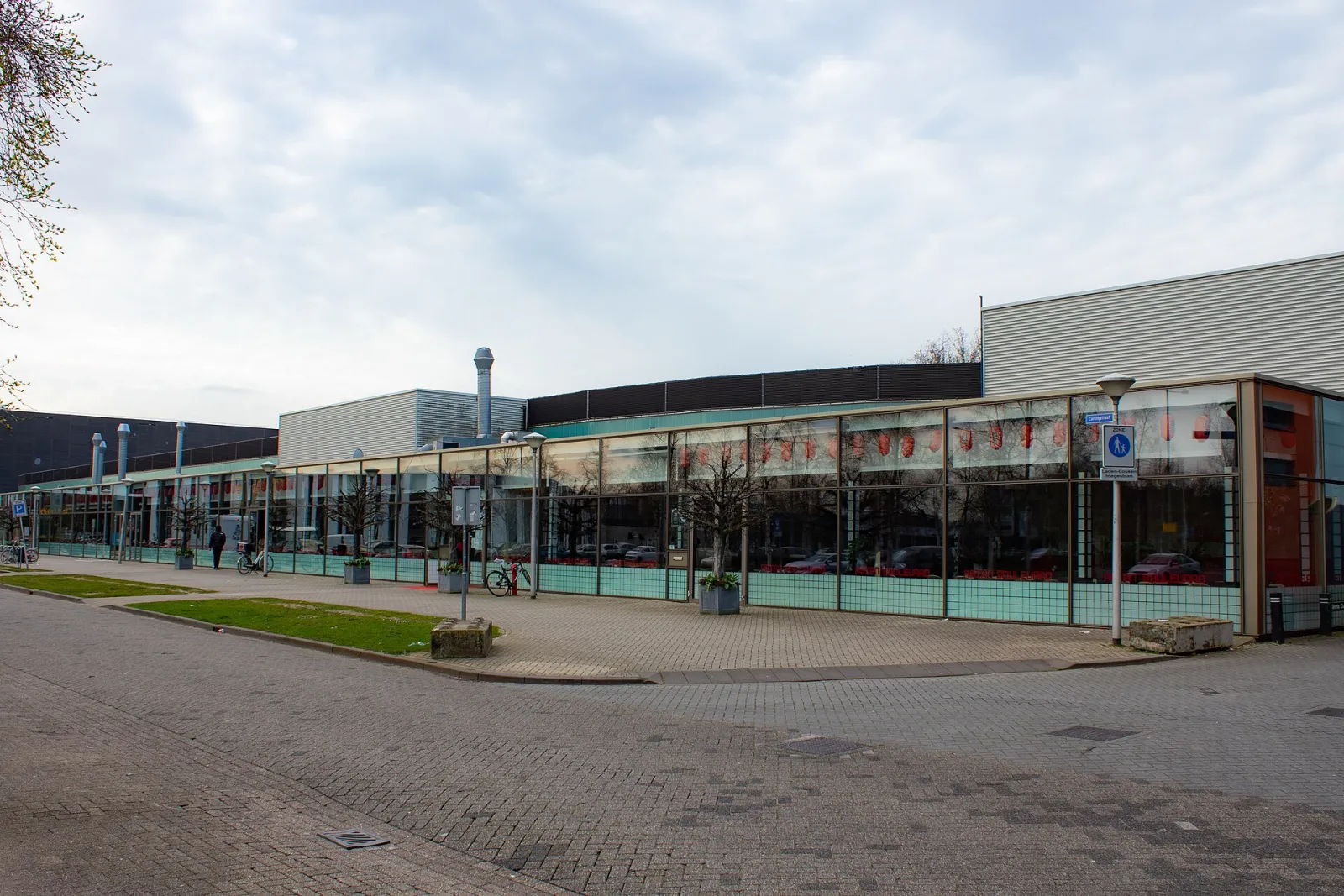 The Ireen Wüst IJsbaan building seen from the street in Tilburg — Ireen Wüst IJsbaan