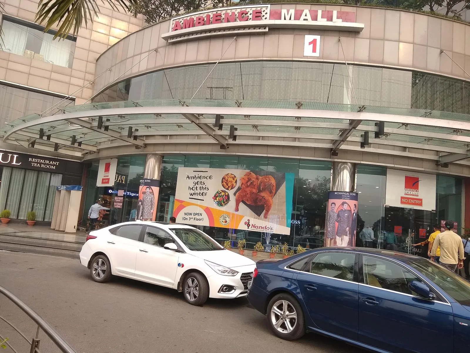 The entrance of Ambience Mall on NH-8 in Gurugram, the mall whose sixth floor holds the ISKATE rink. — ISKATE by Roseate