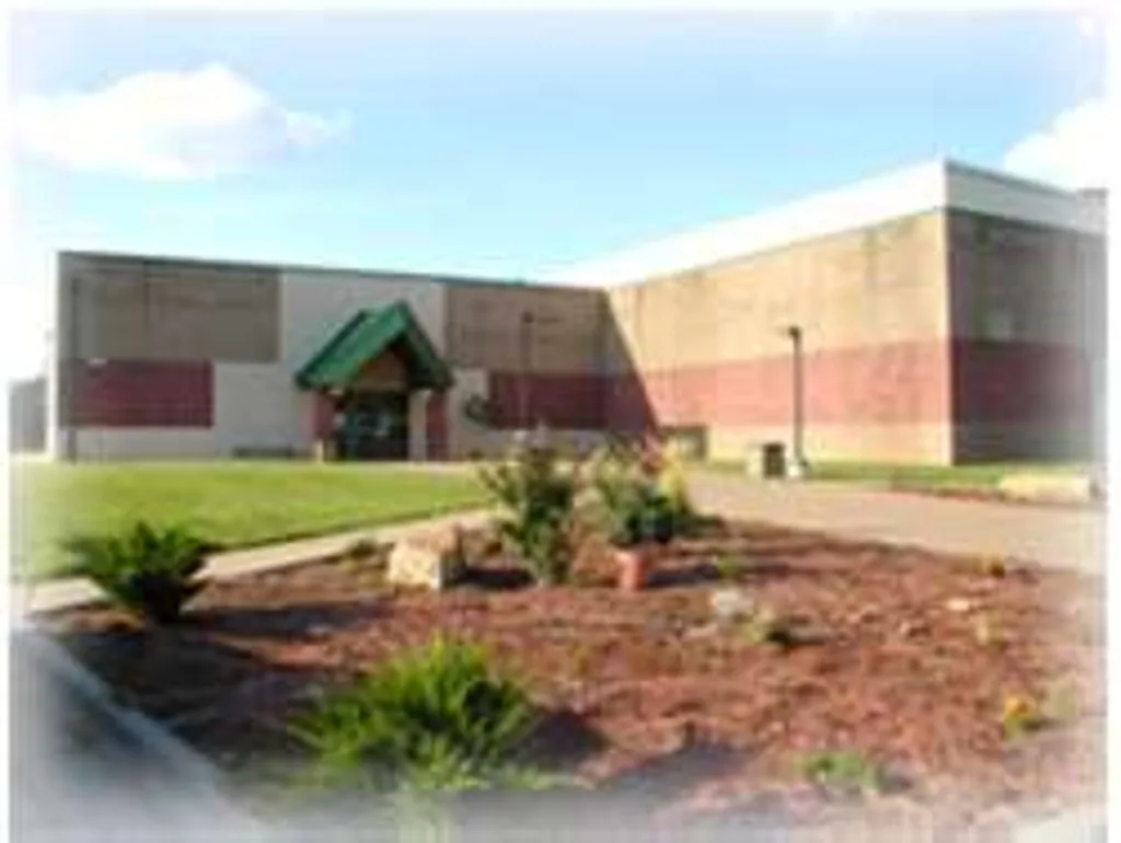 Front of the arena on a sunny day — KC Ice Center